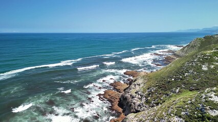 Experience the stunning coastal views that showcase the serene ocean and the rugged shores