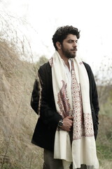 A Kashmiri model dressed in a traditional shawl 
