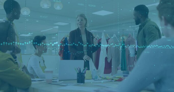 Designer reaching for white top, showing stitching with techpack overlays as team noting swatches