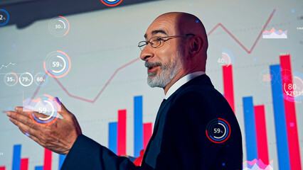 Conceptual visual of a middle-aged Caucasian man giving a presentation and statistical data