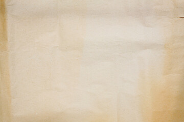 old crumbled paper with lights and shadows, texture background