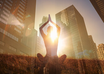 Person meditate, having a calm state of mind in city environment. At work wellbeing, focus, mind and concentration concept. Stress free work mental health.  Double exposure
