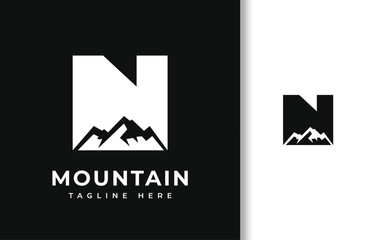 LETTER N WITH SILHOUETTE OF MOUNTAIN LOGO DESIGN
