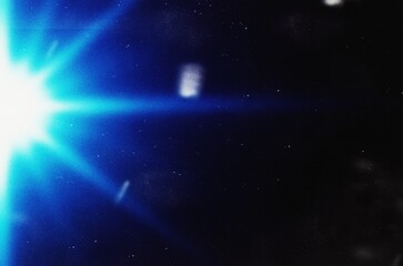 Abstract grainy light leaks photo overlay effect with lens flares effect background, scratches noise dust film grain texture, grunge effect, digital noise texture