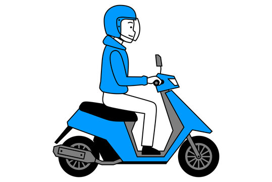 原付バイクを運転する若い男性