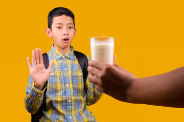 Young Asian Student Boy Refusing Drink Expressing Dislike Or Saying No