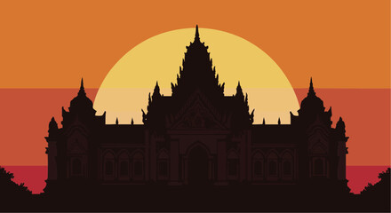 Fototapeta premium Black silhouette of a Thai temple against a Bangkok sunset sky