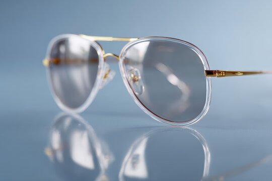 Sunglasses with reflection on clean studio setup