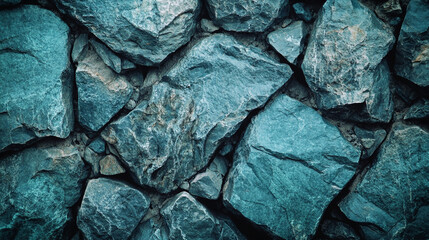 Close-Up of Textured Blue Rocks Arranged in a Natural Pattern. Blue-textured stones form a close-up view showcasing natural textures and rugged patterns.