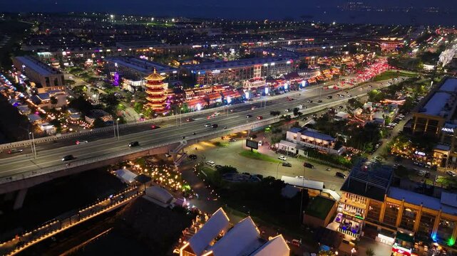 Aerial Shot of a Pagoda in Jakarta, Indonesia Chinatown restaurant complex at night	
