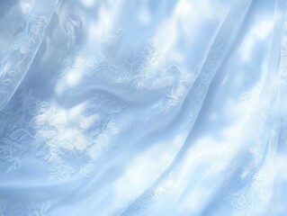Elegant Light Blue Lace Fabric with Floral Embroidery and Soft Folds