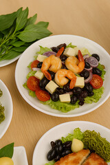 "Colorful Shrimp Salad with Fresh Vegetables and Cheese"