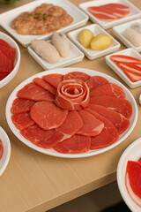 "A Variety of Meat and Ingredients Prepared for a Delicious Meal"
