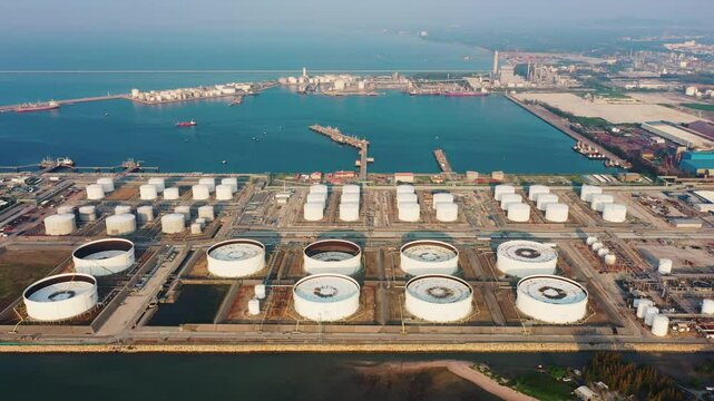 Aerial view or top view oil terminal. Crude oil storage tanks (storage tank) or tank farms are areas used to store large quantities of crude oil before it is taken to the refinery for refining.