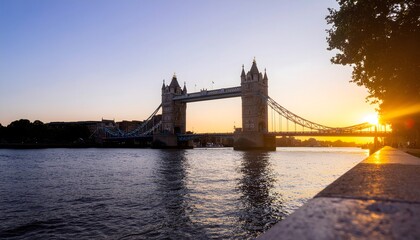 London Tower Bridge at sunset with beautiful river reflection