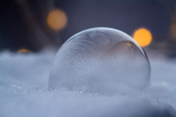 The bubble and the christmas lights on the snow