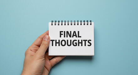 A hand holding a notepad with the words final thoughts written on it over a blue background surface