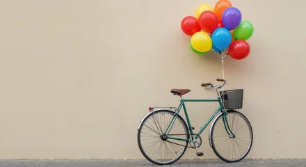 Fototapete Vintage bicycle with colorful balloons against a textured wall   © Vyatcheslav