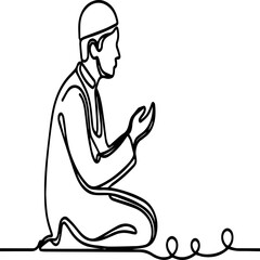 Fototapeta premium A man is kneeling on the ground and praying