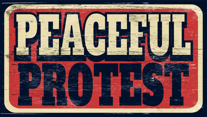 aged and worn peaceful protest sign on wood