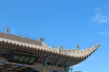 Black plaque with words 