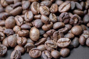 Close up of coffee beans are the background.