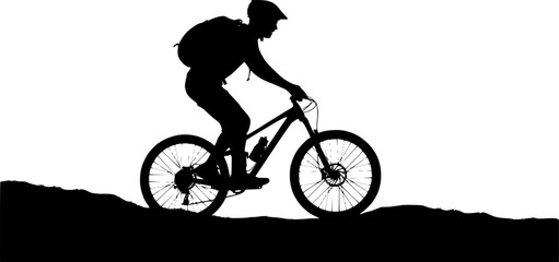 Obraz premium Silhouette of a mountain biker riding on uneven terrain, with a backpack and helmet