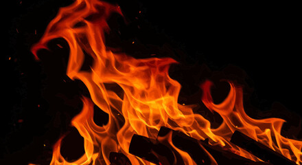 Enchanting Dance of Fiery Flames Against a Dark Canvas, a Captivating Display