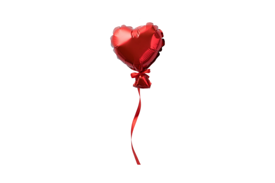 A single red heart shaped balloon with a ribbon on a black background in a studio shot