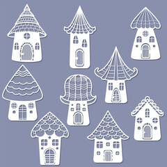 Openwork fairy houses. Set of templates for laser cutting. Flat design. For children's design of postcards, interior decorations, stickers, Christmas tree toys, scrapbooking, etc. Vector