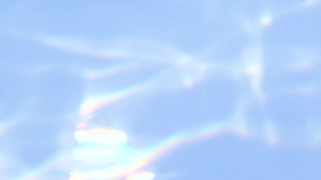 Blue abstract smooth bokeh light leak, water blurred motion, sunlight lens flare
