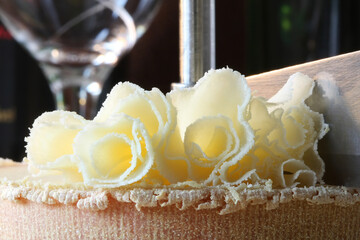 Rosette Closeup of Swiss Cheese Tete de Moine - high key tone