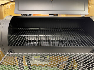 A model of a modern grill - a smokehouse. A new grill.