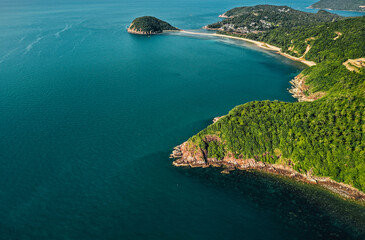 Aerial View of Tropical Island Bay with Lush Green Peninsula