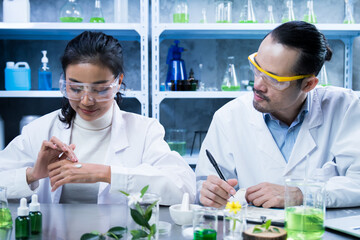 Scientist used biochemistry to test each organic ingredient in the laboratory, ensuring the cosmetic skincare product met safety standards before release.