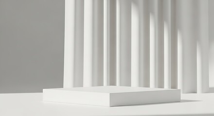 Minimalist white cube platform against fluted backdrop with subtle shadows