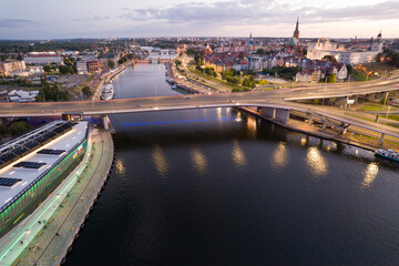 Cityscape at Dusk: Aerial View of River and Bridges. Szczecin Poland.