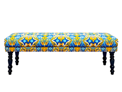 Long upholstered bench with ornate blue and yellow pattern on a black background in studio setting - Powered by Adobe