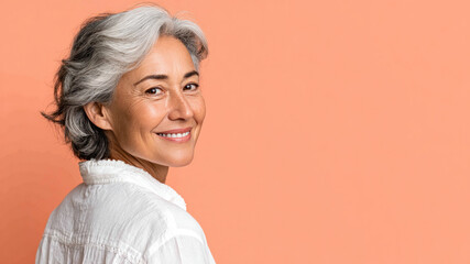 Senior Arabian woman smiling isolated on pastel background for retirement concept