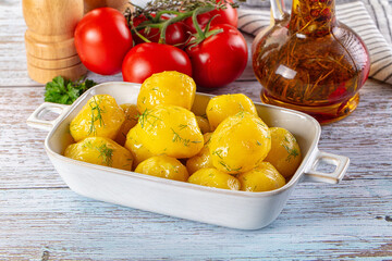 Boiled young potato with oil