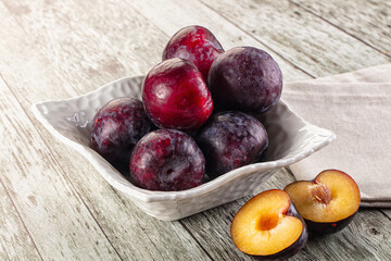 Ripe sweet juicy plum heap