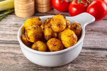 Baked small baby potato with herbs