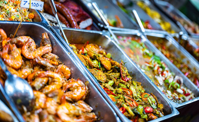 Thai street food sold at Banzaan Fresh Market in Patong, Phuket