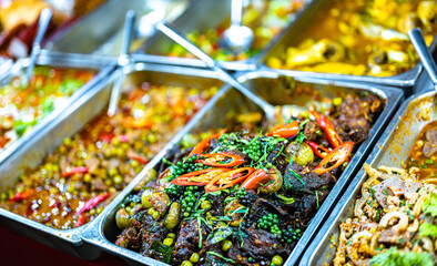 Thai street food sold at Banzaan Fresh Market in Patong, Phuket