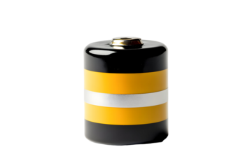 Black and yellow battery with a silver stripe isolated on black background