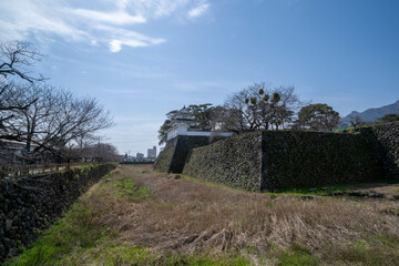 There are towers of Shimabara Castle on the castle wall across the moat in Nagasaki prefecture, JAPAN.