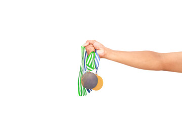 Victorious Athlete Proudly Displays Hard-Earned Medals Held Tightly in Hand isolated