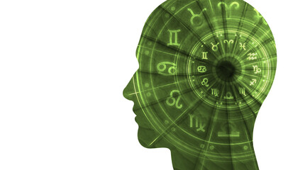 Astrology and horoscopes concept. Silhouette of face with leaf texture with the zodiac circle and signs of the zodiac.