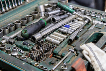 Closeup photo shoot of different nesessary tools and parts in every man's garage.Auto check up and...