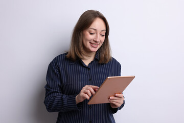 Fototapeta premium Woman with modern tablet on white background